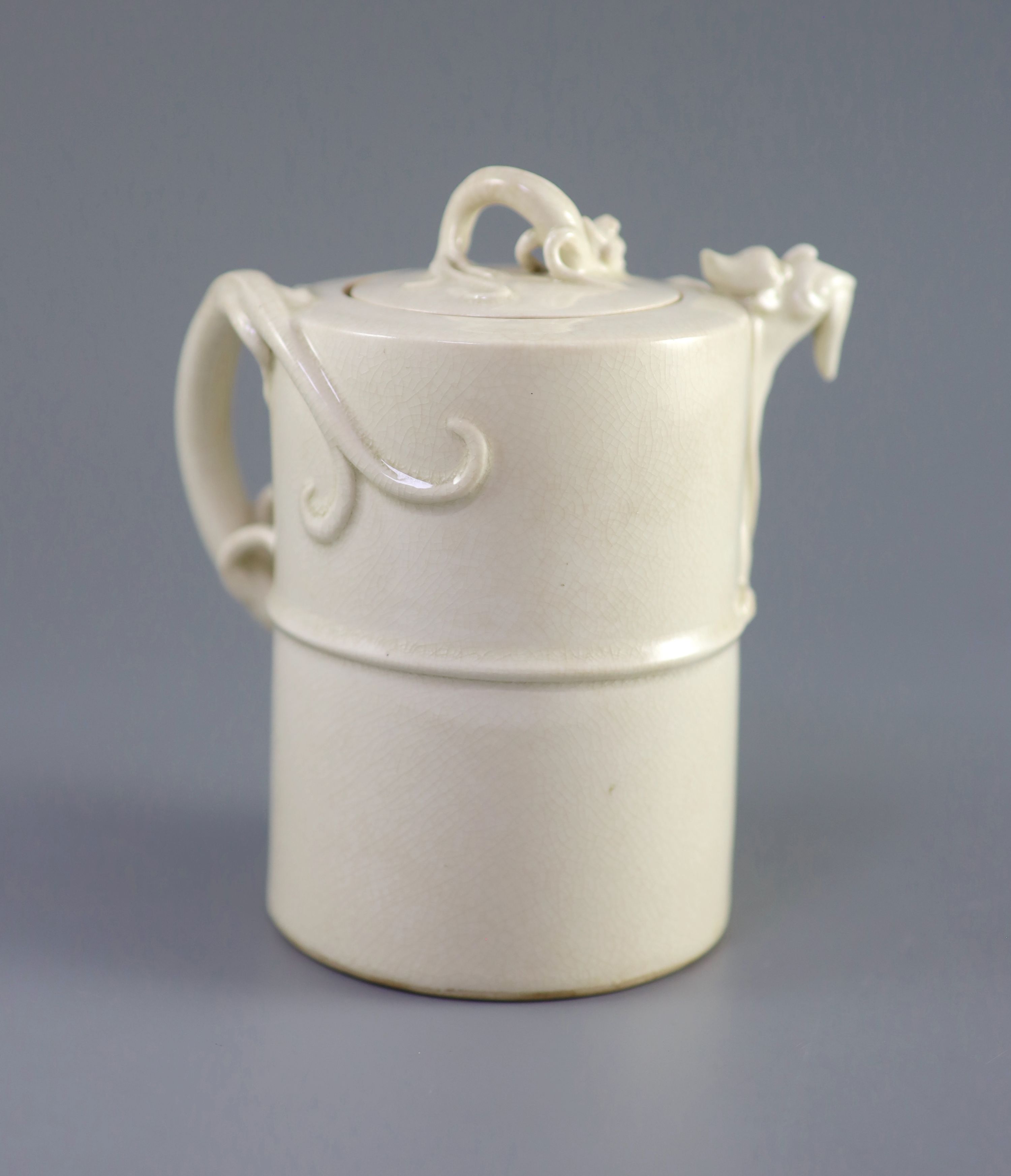 A Chinese soft-paste blanc-de-chine wine ewer, 19th century, 15.5cm high